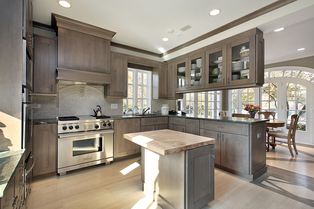 Kitchen with wood cabinetry and island